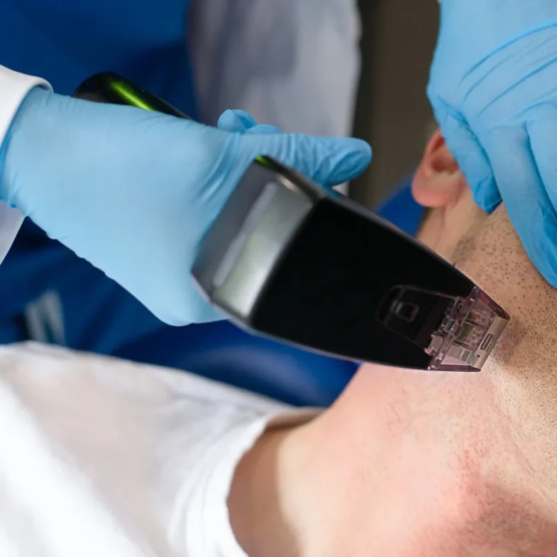 Man getting beard shaved